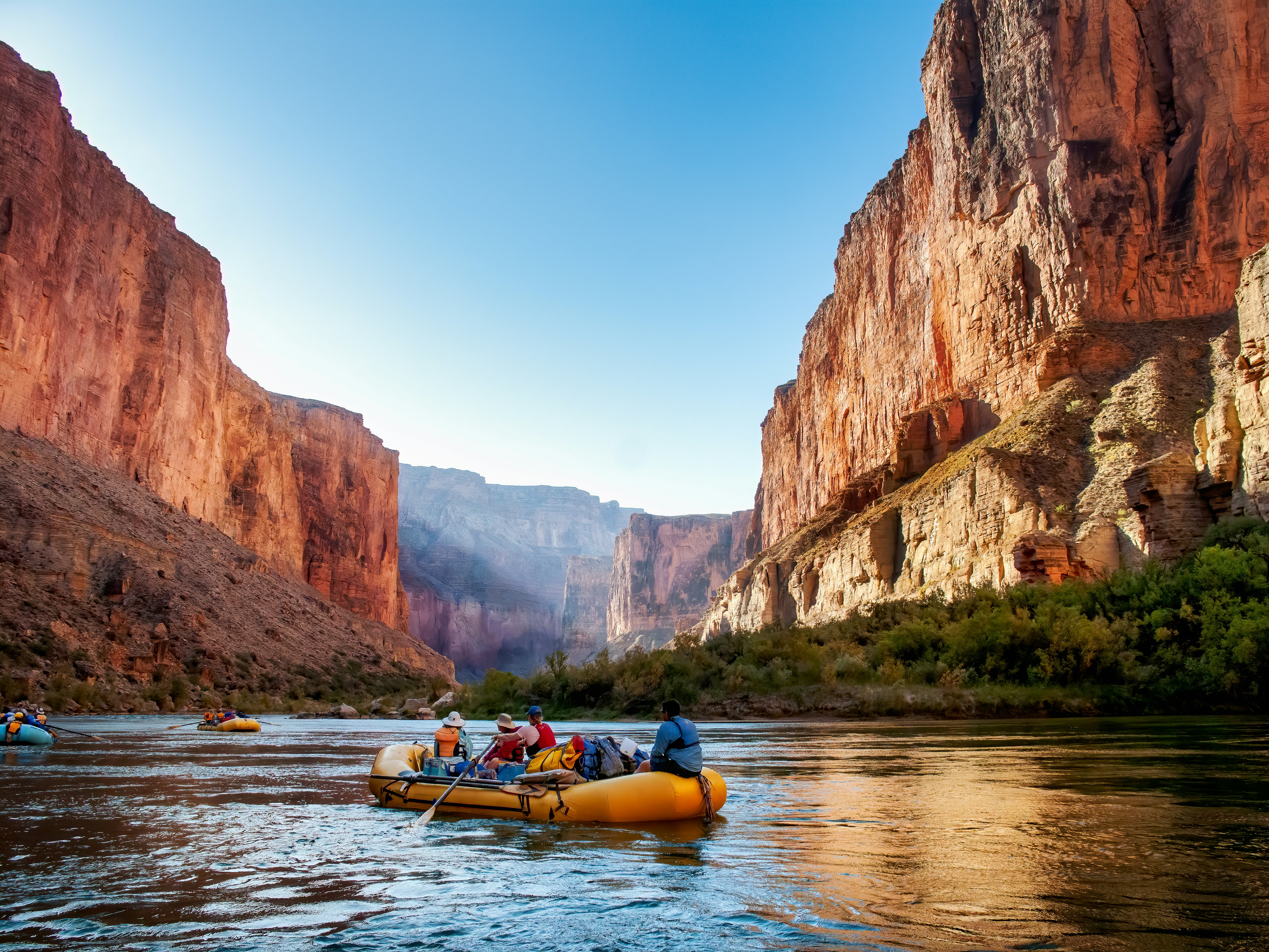 Rafting at sunrise on the Colorado River in the Grand Canyon, Arizona, USA