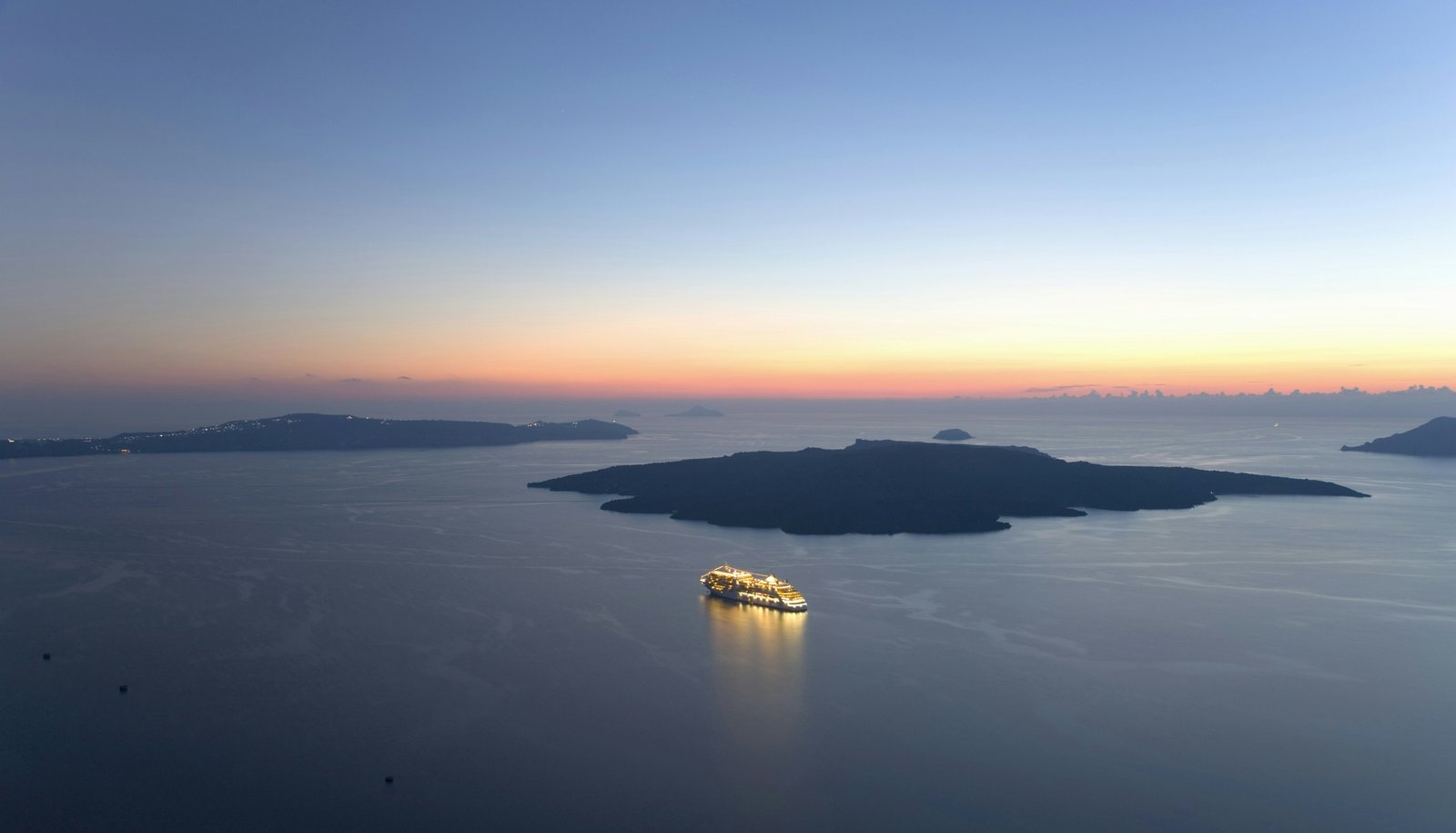 The caldera after sunset, in Fira, Santorini, Greece.