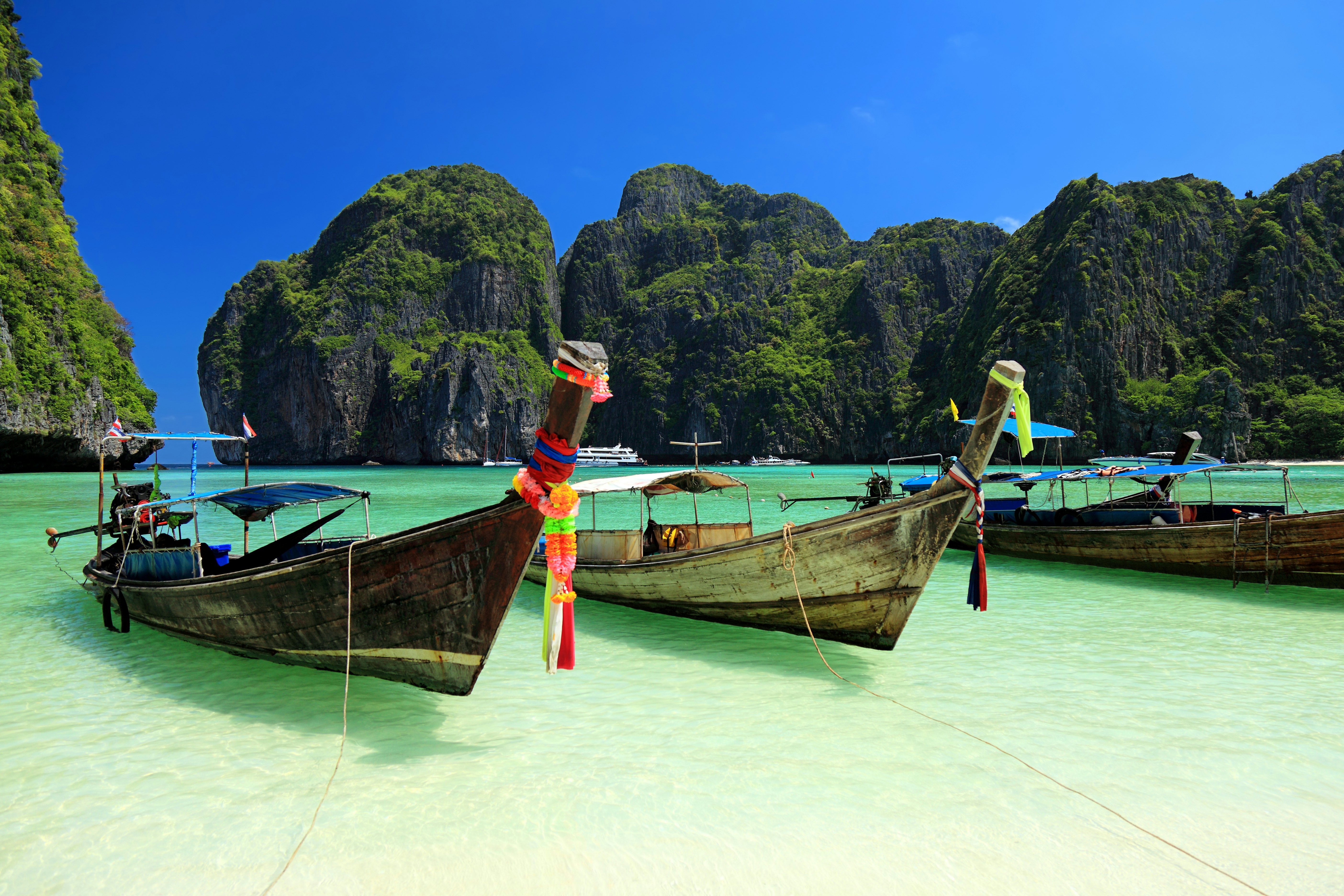 Long tail wooden boats moored at Maya Bay-Phi Phi Islands-Thailand