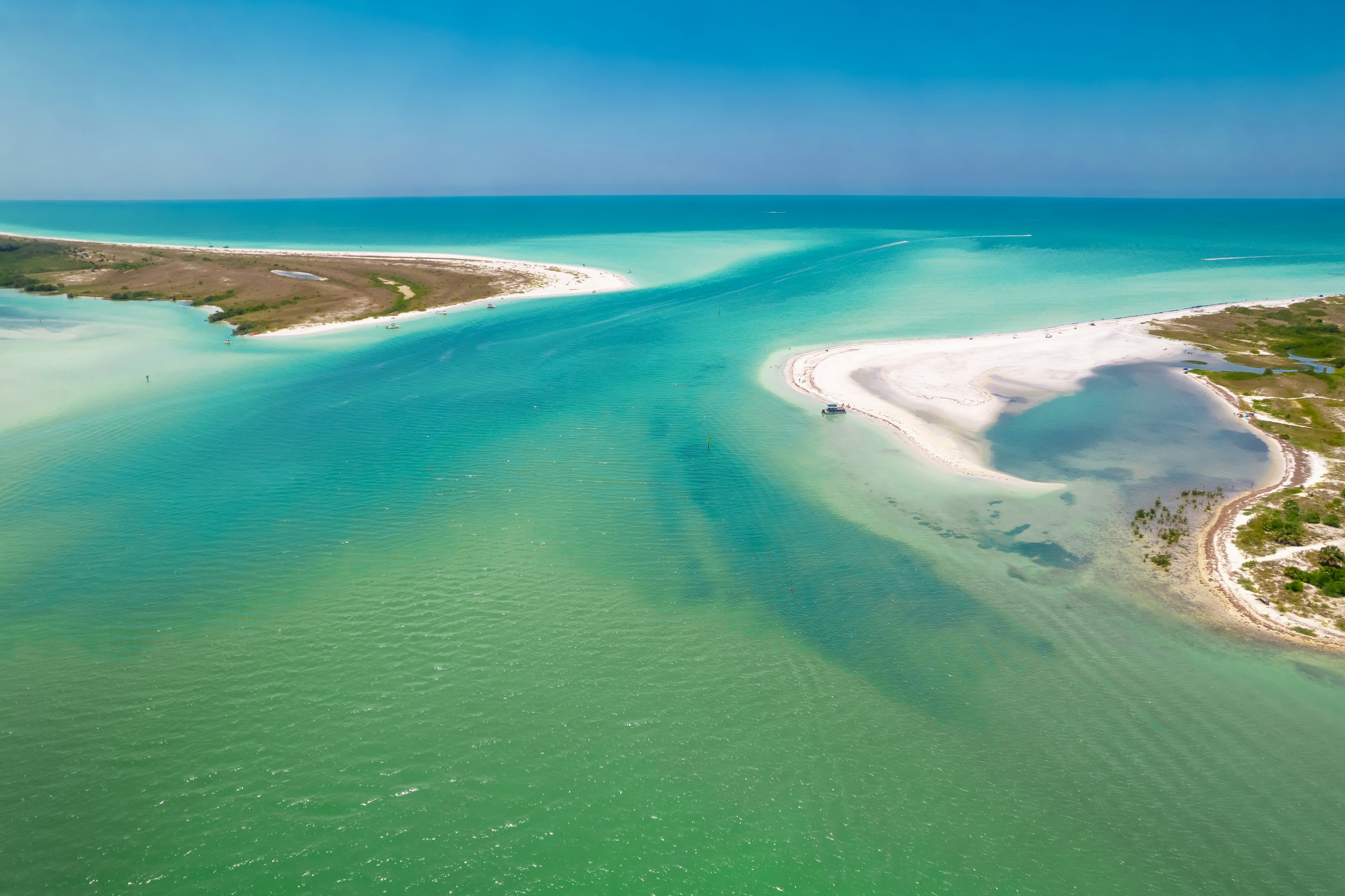 Island. Florida beach. Panorama of Caladesi island and Honeymoon Island State Park. Summer vacation in USA. Blue-turquoise color of salt water.