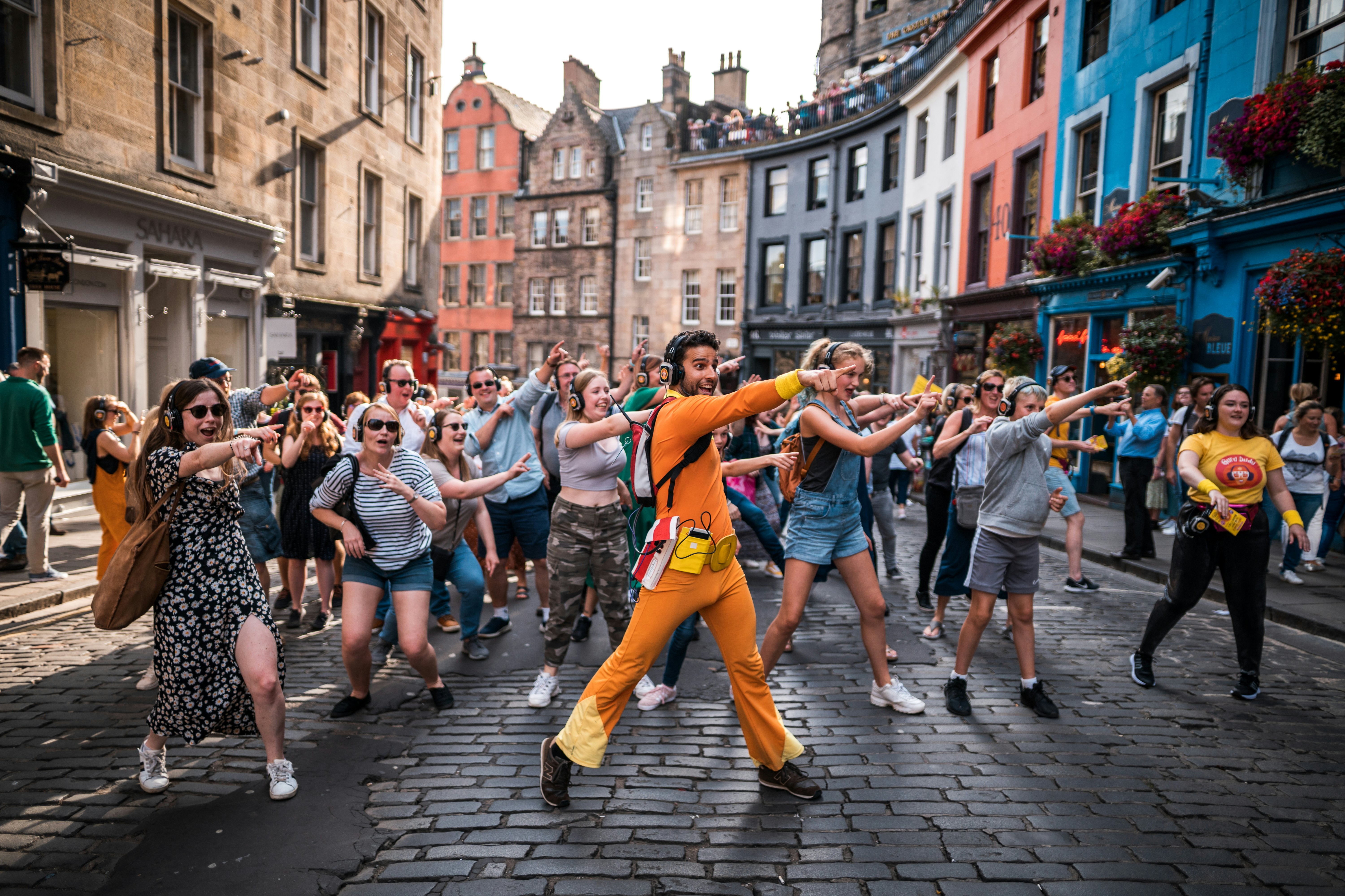 People enjoying the Guru Dudu Silent Disco during the Edinburgh Fringe Festival.
