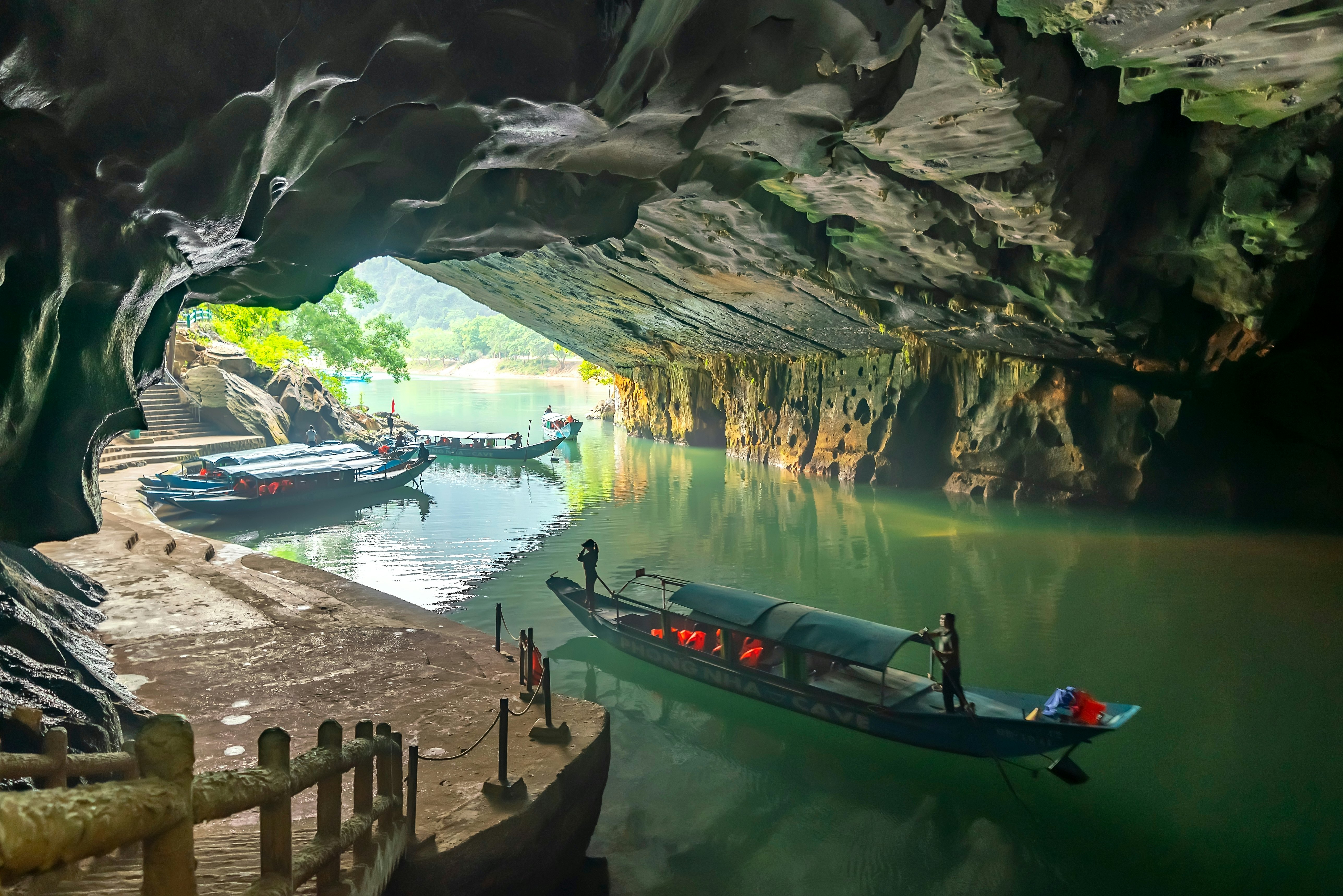 Boats inside Phong Nha Cave in Phong Nha-Ke Bang National Park, a UNESCO World Heritage Site in Vietnam.