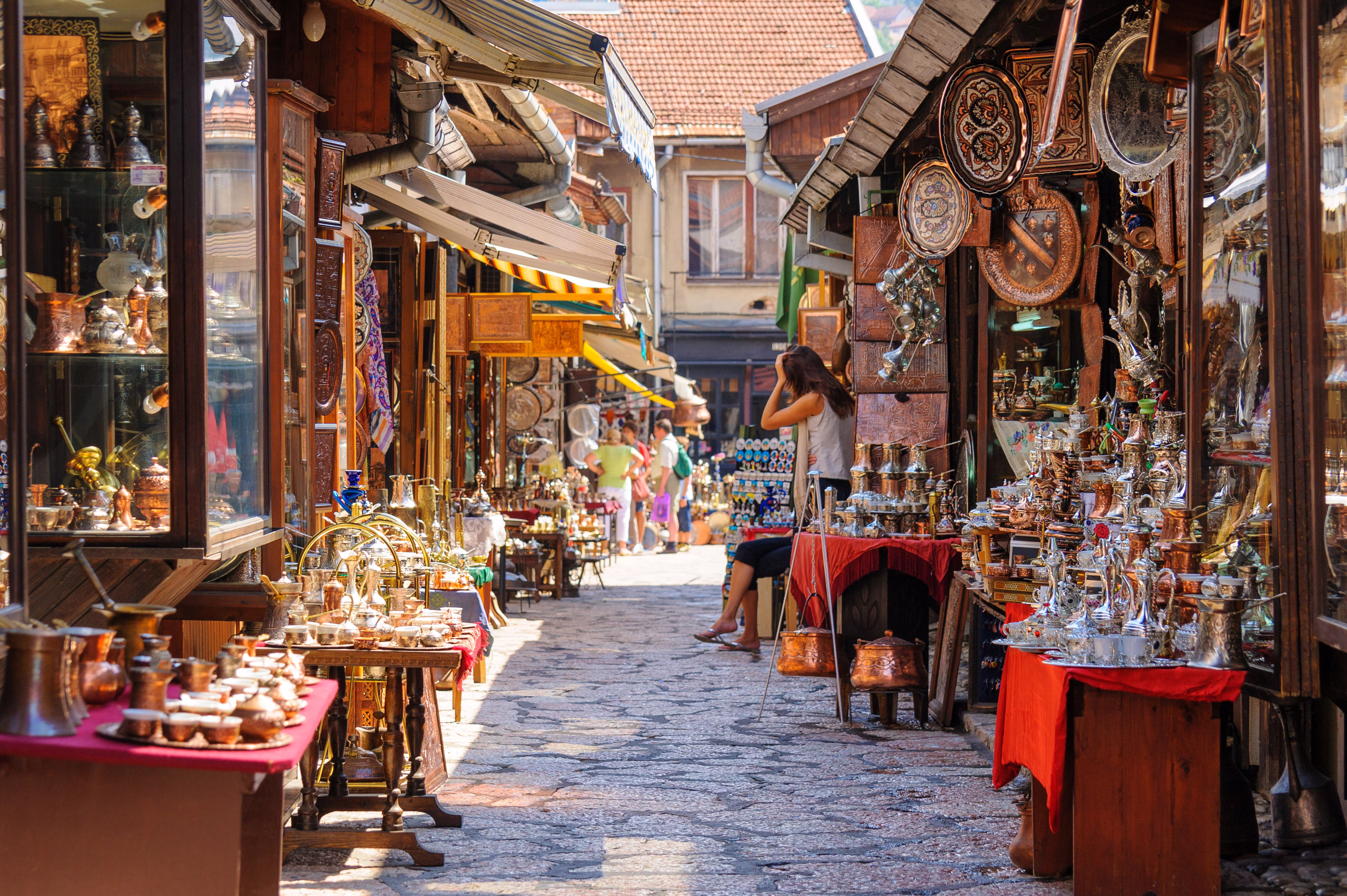 SARAJEVO, BOSNIA AND HERZEGOVINA - SEPTEMBER 4, 2009: Street with shops selling souvenirs at Bascarsija in the old city district License Type: media Download Time: 2024-01-12T07:03:34.000Z User: dermothegarty77 Is Editorial: Yes purchase_order: